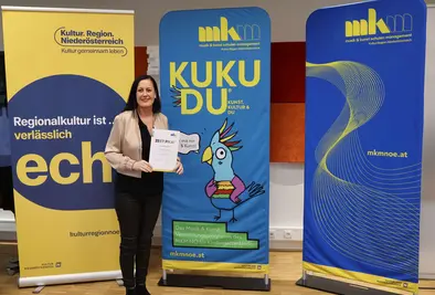 Teilnehmende Person mit Zertifikat.